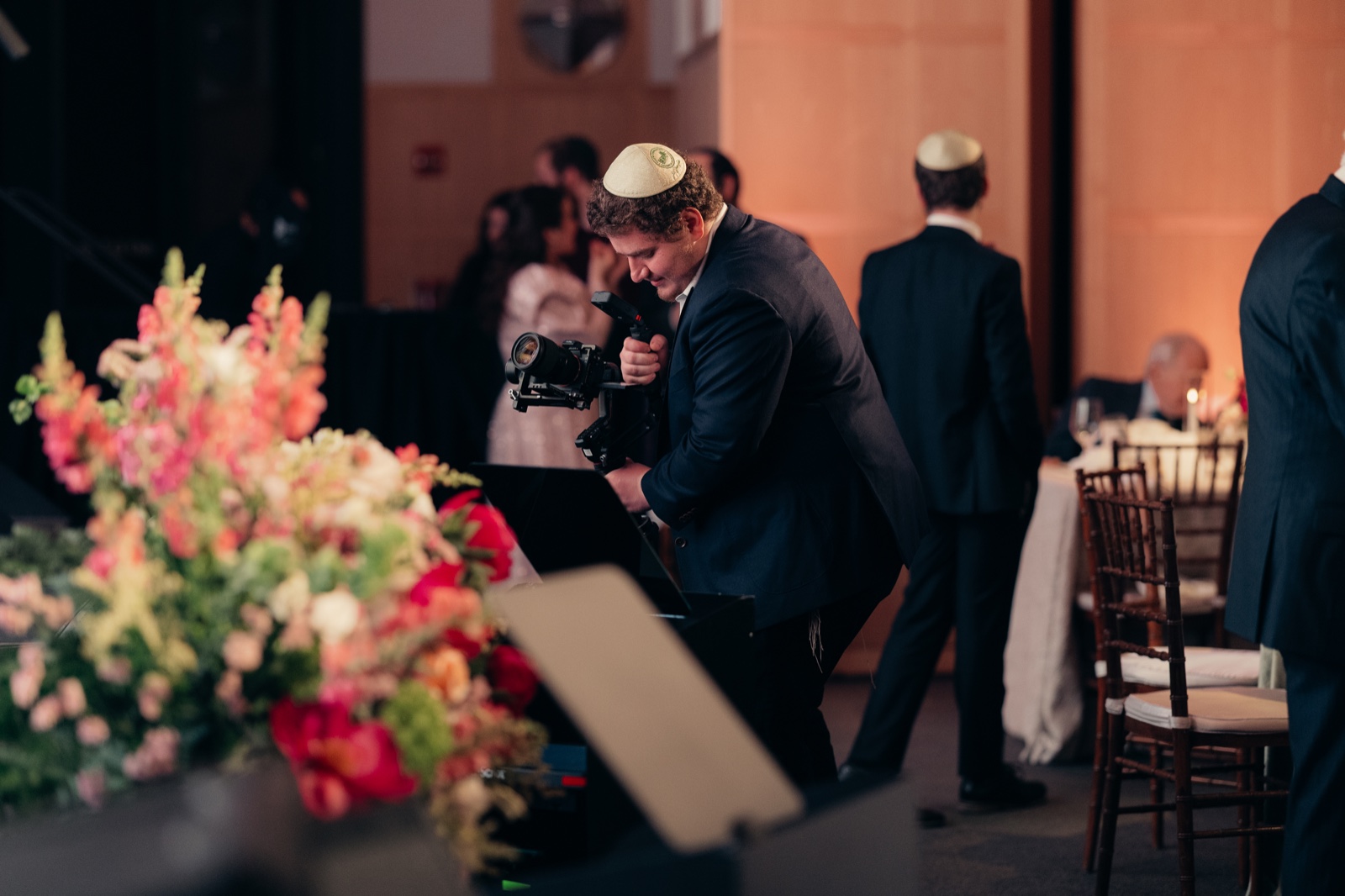 Dov Goldstein filming with his camera